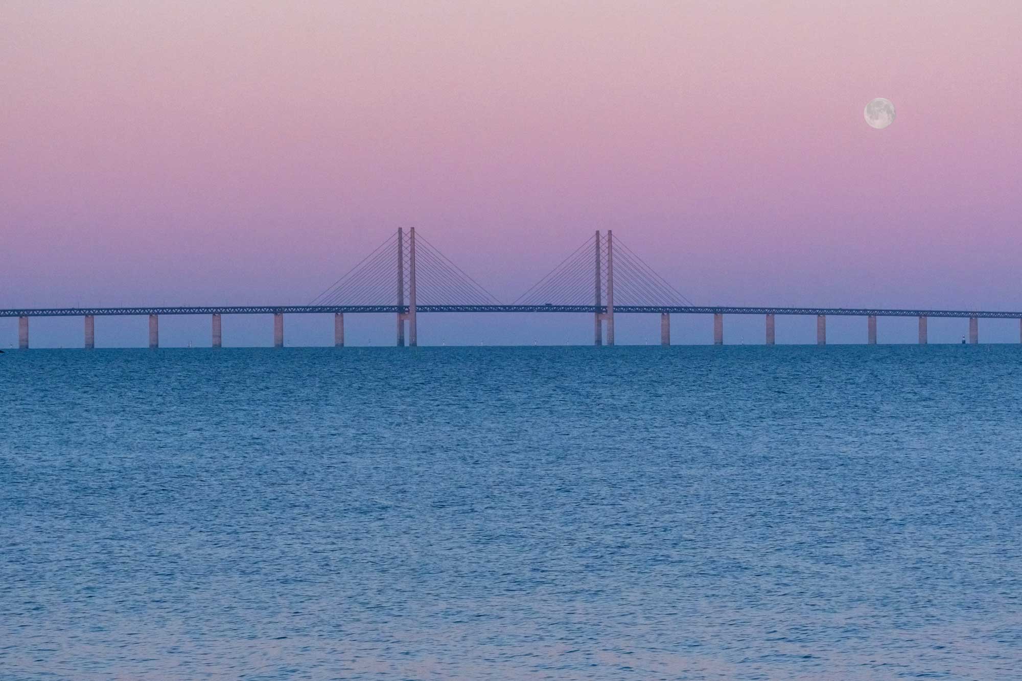 The Öresund Bridge with a full moon