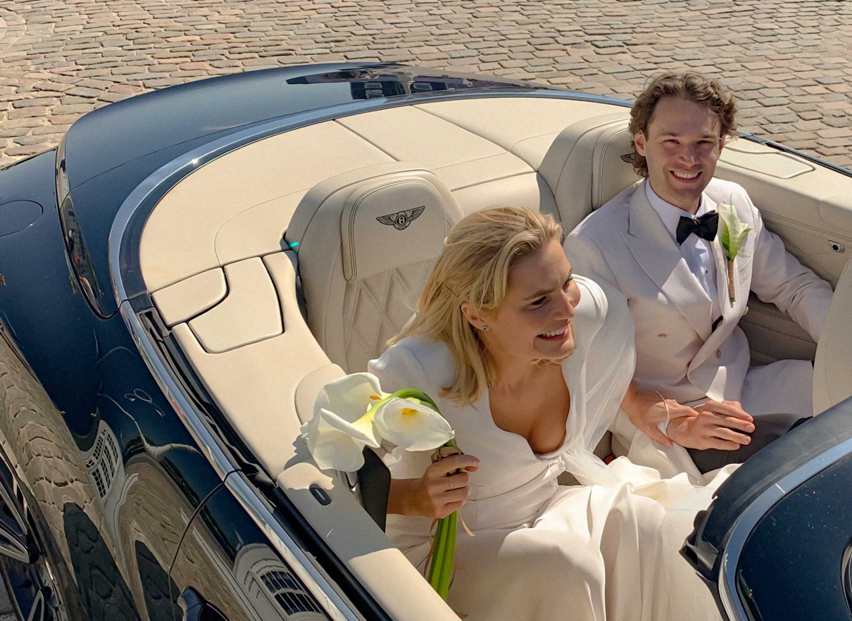Hugo and Christina's wedding getaway car, a shiny Bentley