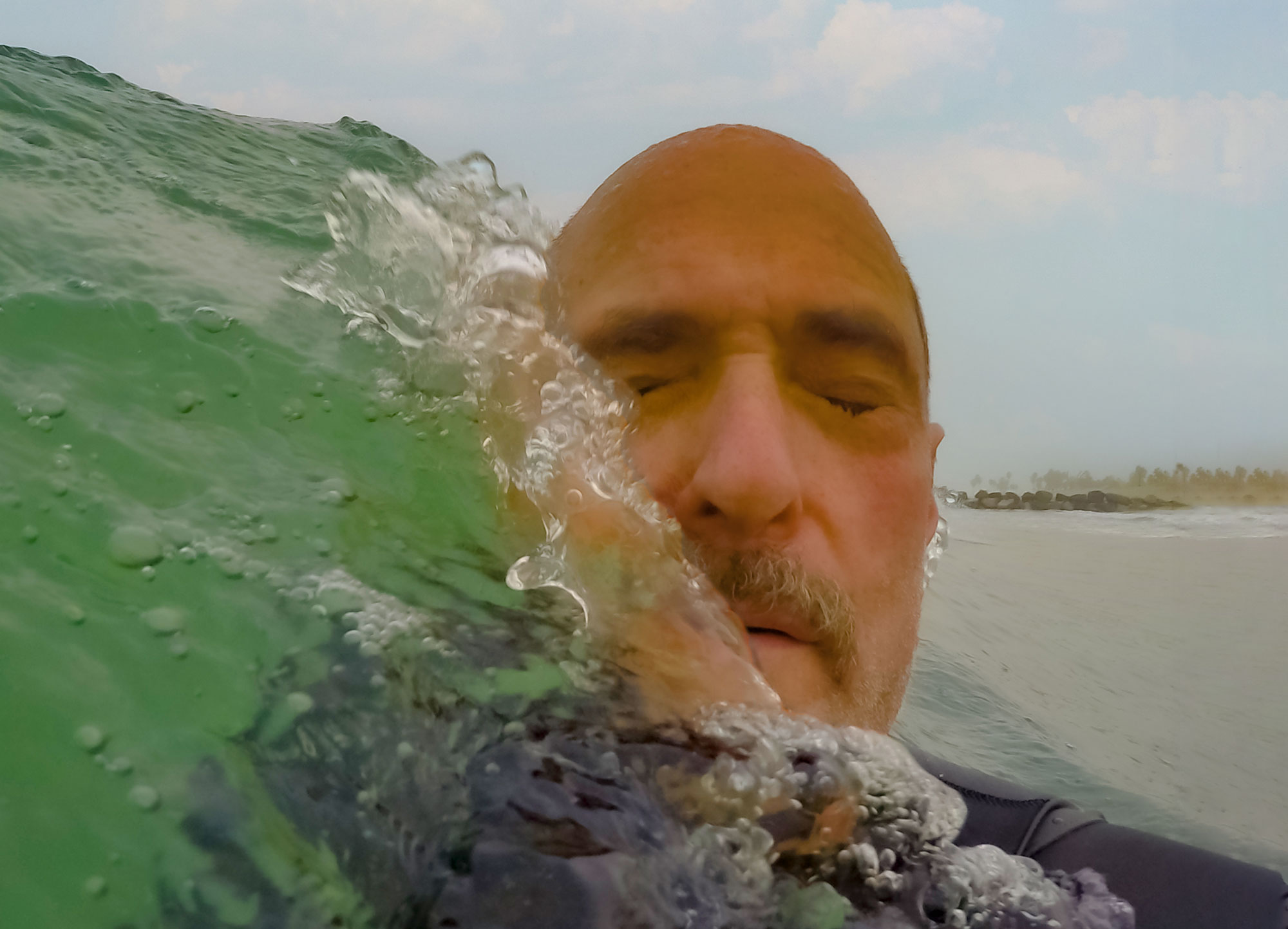 into the wave