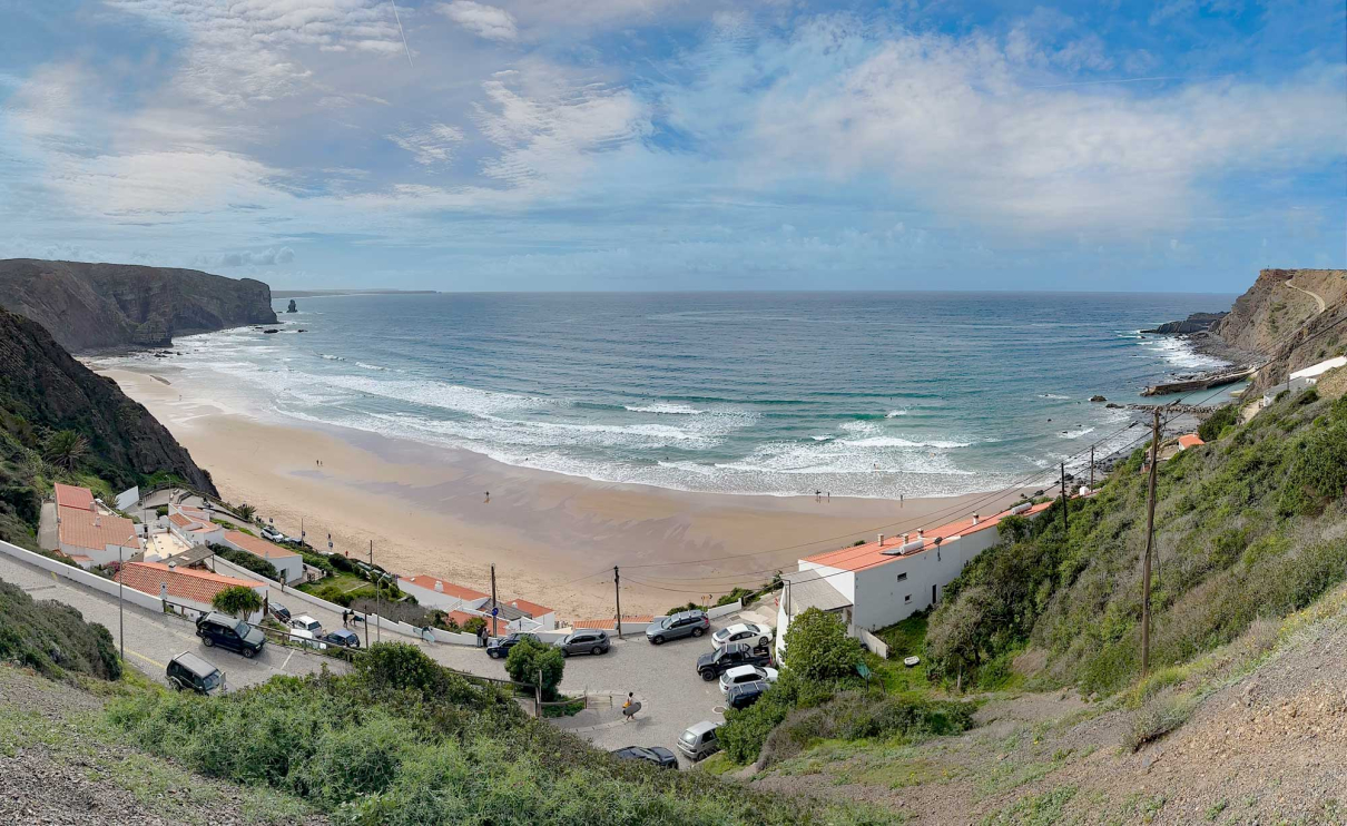 Surfing Arrifana Beach near Aljezur