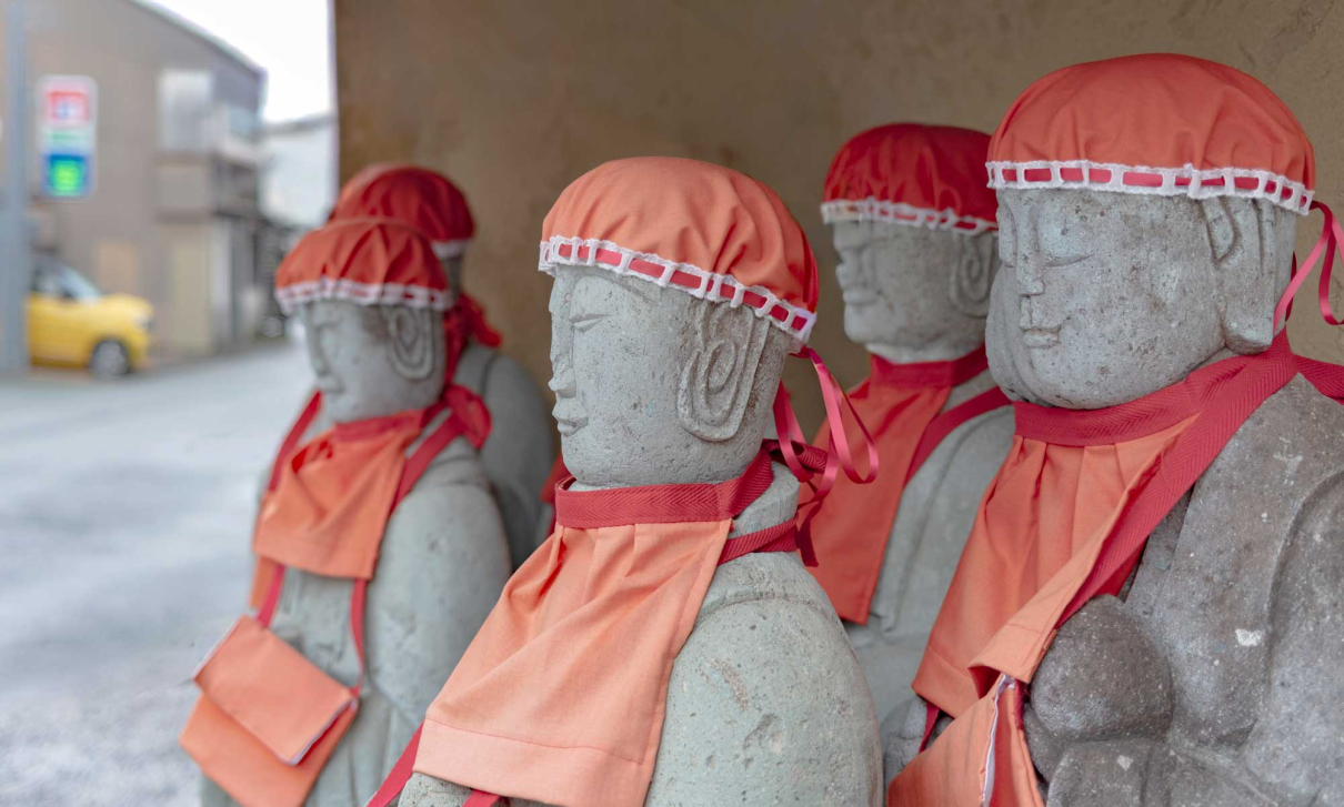 Figures of Jizo or Ojizo-san near the river in Kanazawa, Japan.